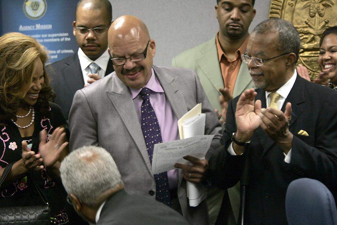 In this Oct. 14, 2009 file photo, radio host  Tom Joyner receives the pardon he was seeking for his great uncles  who were executed in South Carolina in 1913 in the death of a 73-year-old  Confederate veteran.