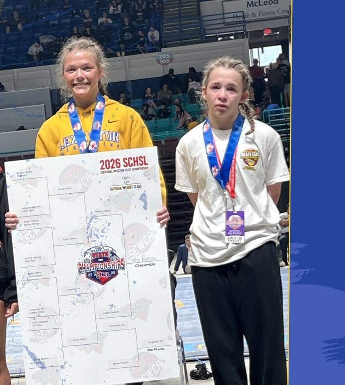 Lexington’s Grace Beeson, left, won the 120-pound title at SC High School League’s girls wrestling state championship on Feb. 21, 2026.