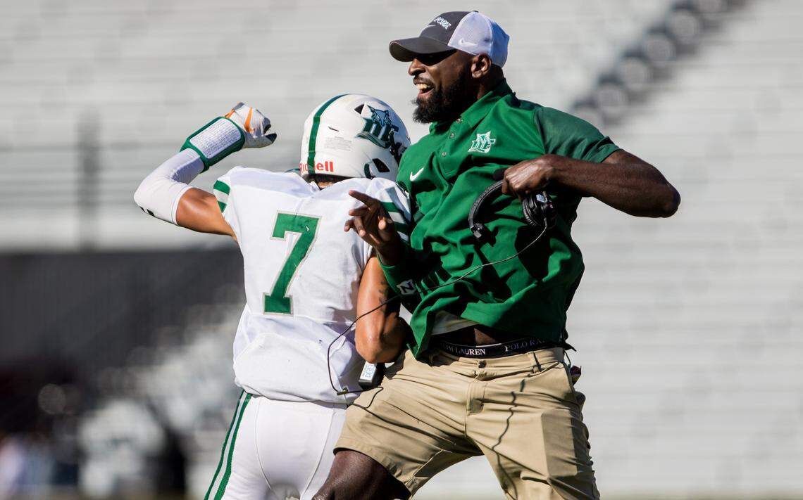 From 2019: Dutch Fork wide receiver Jalin Hyatt (7) celebrates with WRs coach Jason Barnes after a touchdown reception in the state championship game at Williams-Brice.