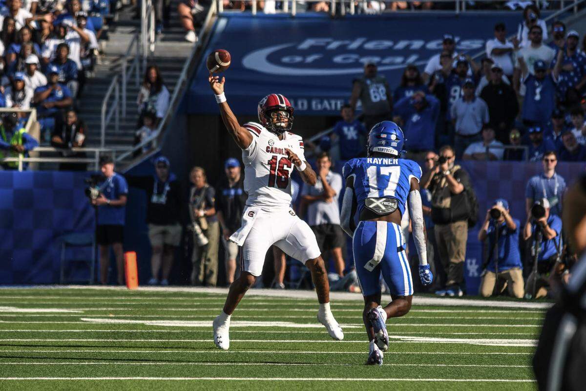 South Carolina Gamecocks quarterback LaNorris Sellers (16) gets off a pass in front of Kentucky Wildcats linebacker Daveren Rayner (17) during a football game against Kentucky Saturday, Sept. 7, 2024 at Kroger Field in Lexington, Ky.