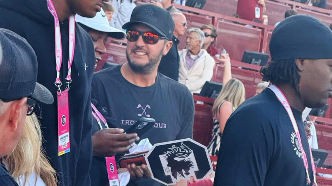 Why was country music star Luke Bryan at South Carolina-Alabama football game?