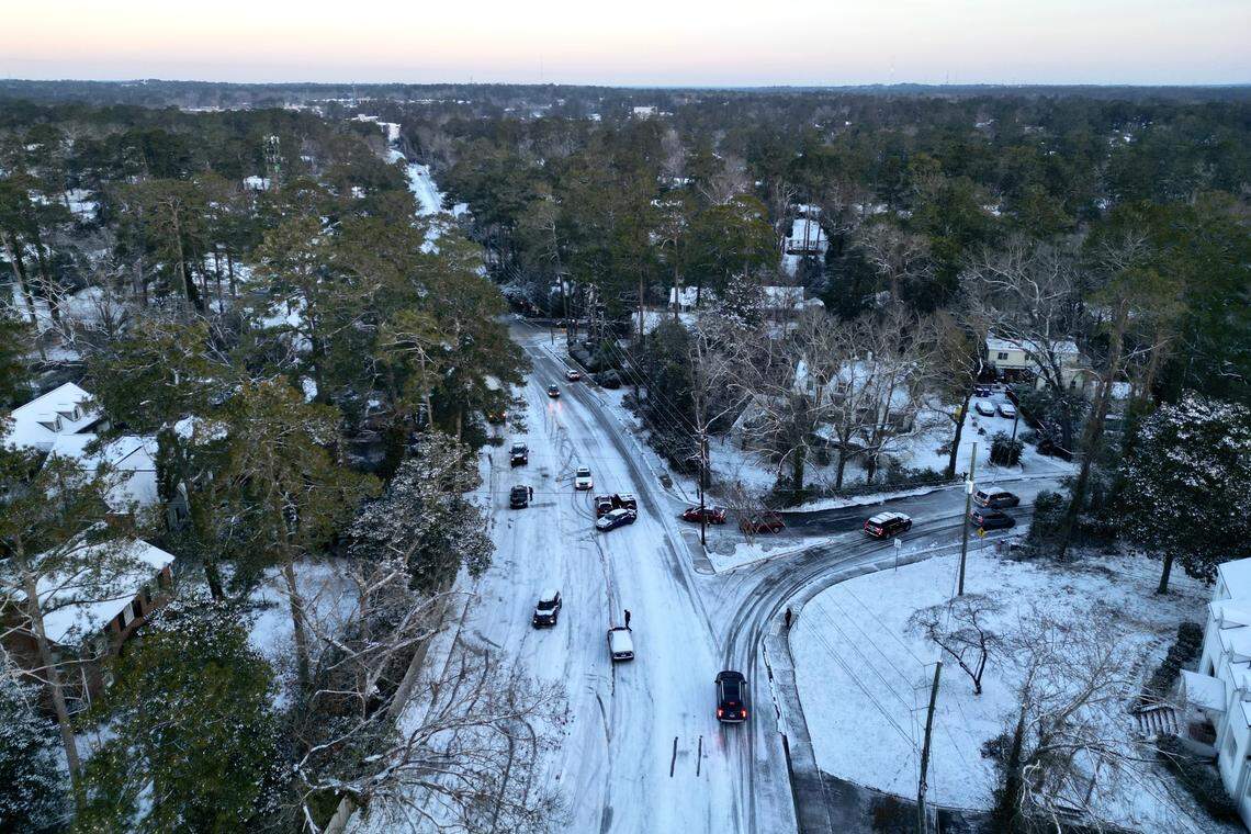 Aerial footage of stalled cars on a road in Columbia.