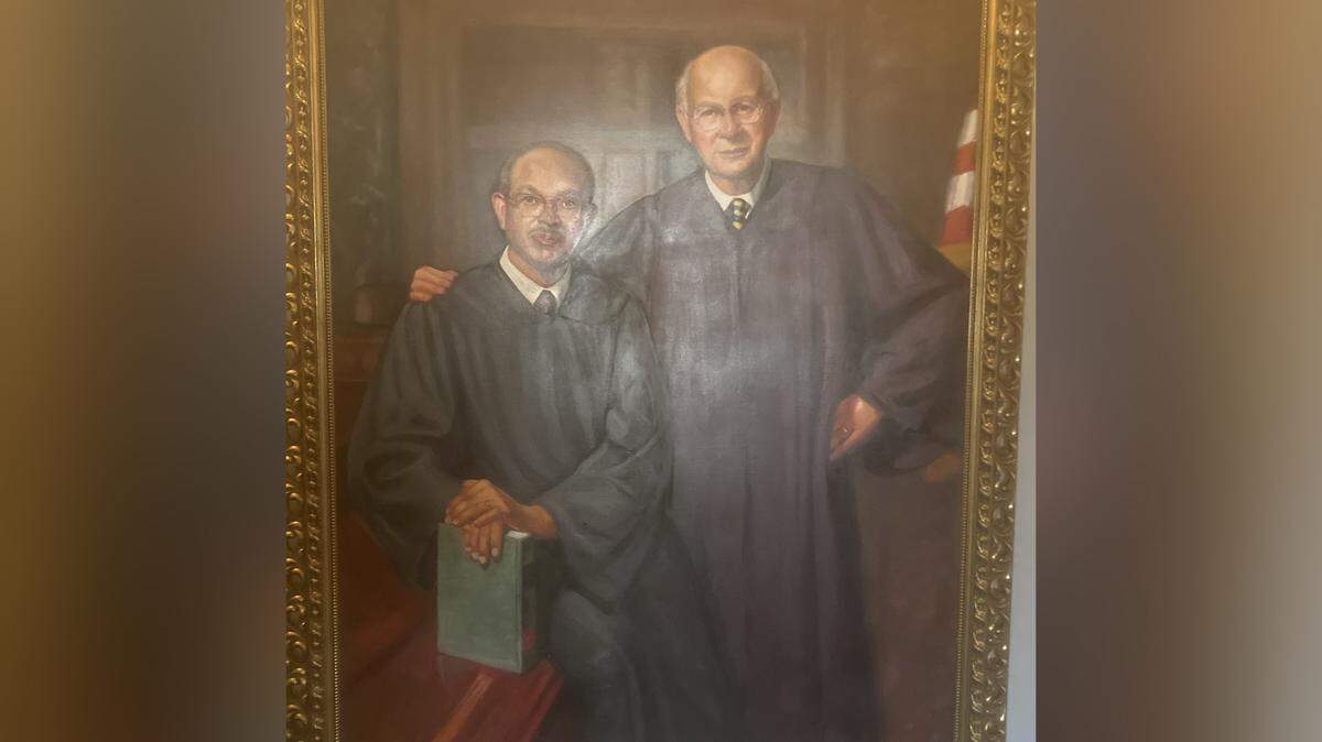 The friendship of Judge Jasper Cureton, left, and his fellow judge, C. Tobert Goolsby, who had prosecuted those who fought for civil rights, was so deep they decided to have their official judges’ portrait painted together.