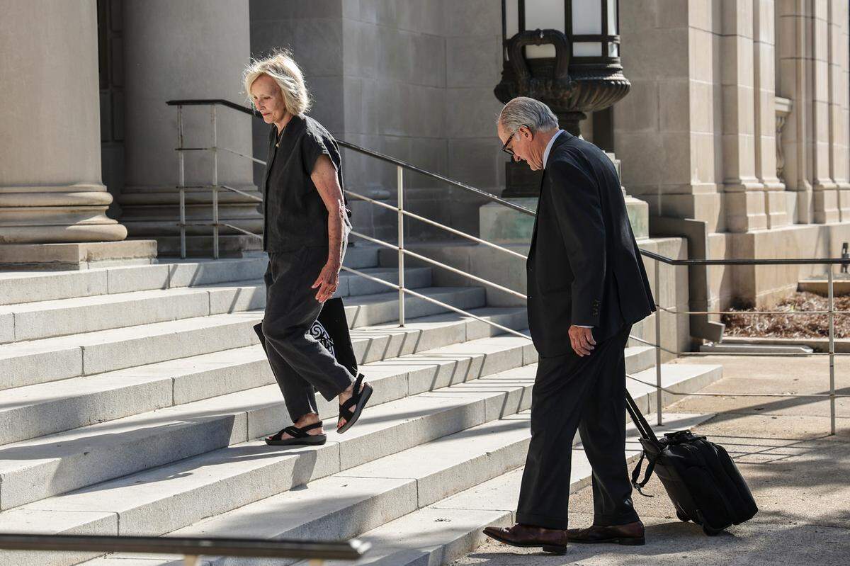 Adele and Tom Pope enter the South Carolina Supreme Court for her contempt of court trial on Wednesday, May 29, 2024.  Adele Pope has been involved James Brown’s estate since 2007. 