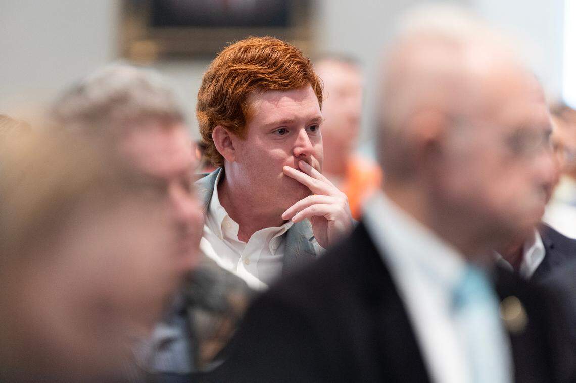 Buster Murdaugh, the son of Alex Murdaugh, listens as his father, Alex Murdaugh, testifies in his own trial for murder at the Colleton County Courthouse on Thursday, February 23, 2023. Joshua Boucher/The State/Pool