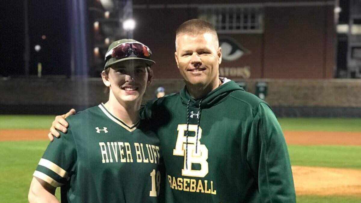 River Bluff’s Alex Urban, left, poses for a photo with Gators coach Mark Bonnette after Urban won the Home Run Derby at the NaturChem Invitational on Saturday, March 2, 2019. It was second straight year Urban won the contest.
