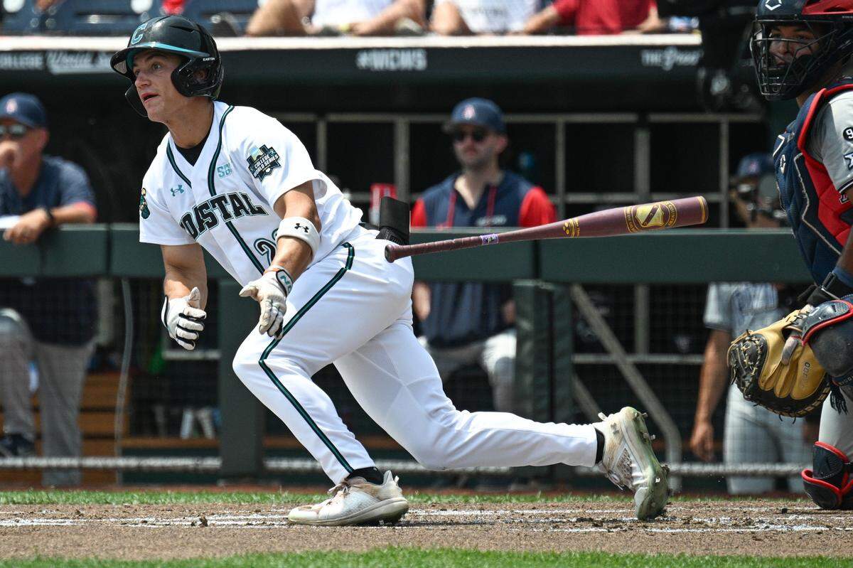 Coastal Carolina Chanticleers right fielder Blagen Pado (22) singles against the Arizona Wildcats during the second inning at Charles Schwab Field.