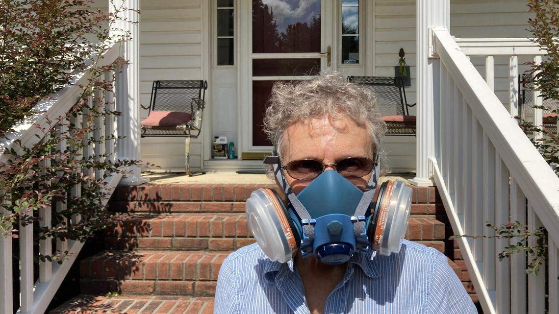 York County, SC resident Betty Rankin says she sometimes wears a gas mask to protect herself from fumes released by a paper mill nearby. (Sept. 14, 2022)