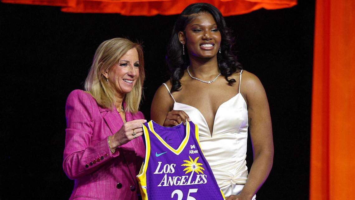 Apr 14, 2025; New York, New York, USA; Sania Feagin poses with WNBA commissioner Cathy Engelbert after being selected with the number twenty one overall pick to the Los Angeles Sparks in the 2025 WNBA Draft at The Shed at Hudson Yards.