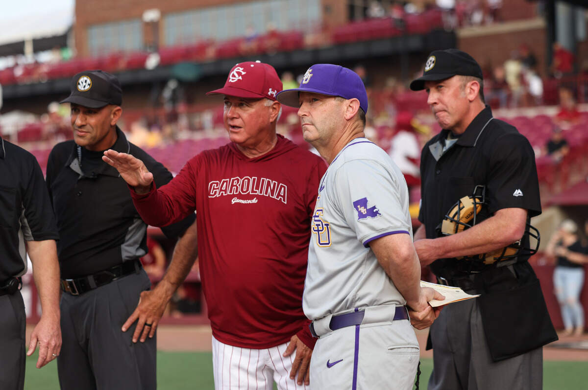South Carolina head coach Paul Mainieri and LSU head coach Jay Johnson speak before the Gamecocks’ game against LSU at Founders Park in Columbia on Thursday, May 15, 2025.