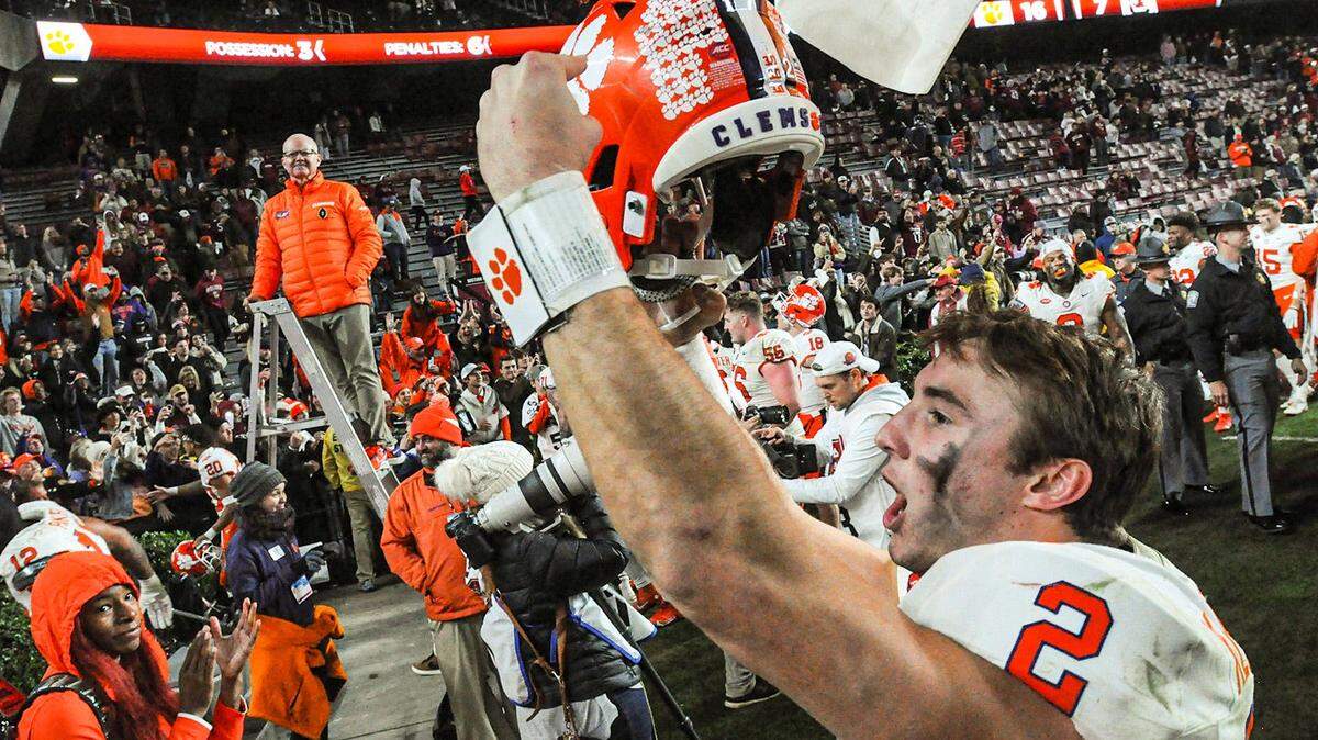 Clemson quarterback Cade Klubnik (2) points to the Tiger Paw on his helmet after the Clemson vs South Carolina football game Nov 25, 2023 at Williams-Brice Stadium. Clemson beat South Carolina 16-7.