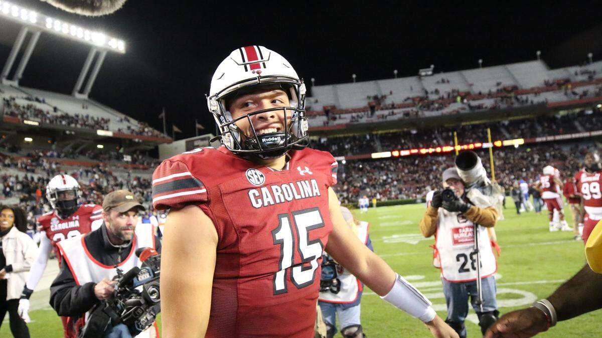South Carolina quarterback Jason Brown (15) walks off the field after leading the Gamecocks to a win over Florida on Saturday, Nov, 6, 2021 at Williams-Brice Stadium.