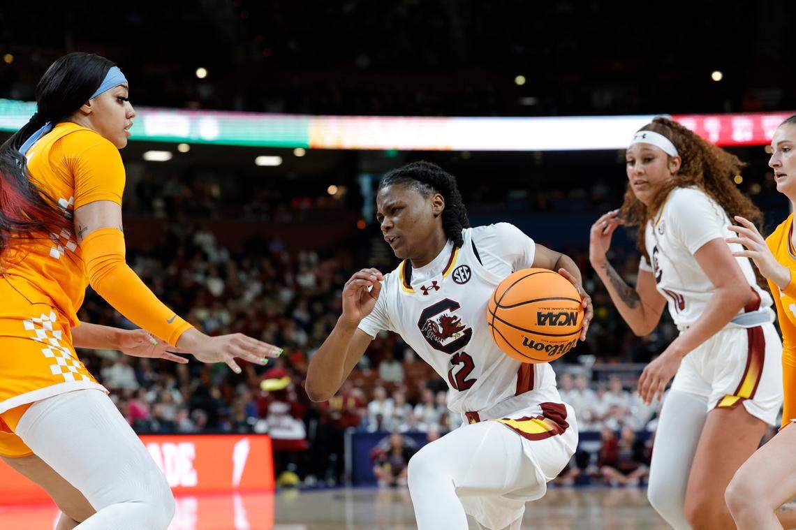 South Carolina’s MaLaysia Fulwiley (12) drives to the basket as Tennessee’s Tamari Key (20) pressures during the first half of action in the Bon Secours Wellness Arena in Greenville on Friday, Mar. 8, 2024