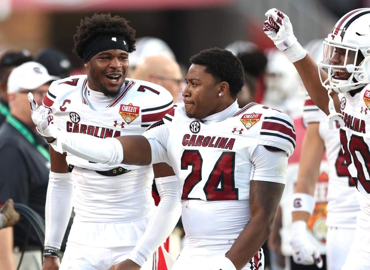 Nick Emmanwori (7) cheers a South Carolina interception in the second half of Tuesday’s bowl game.