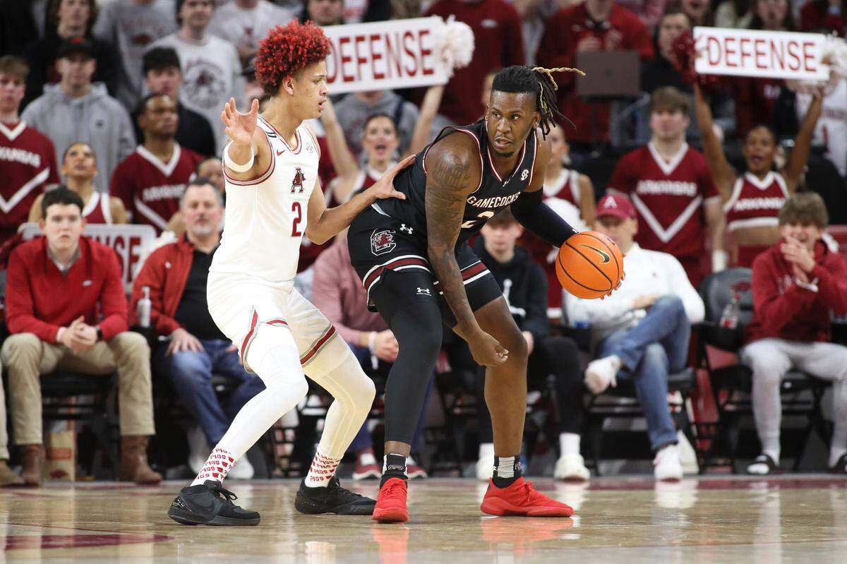 South Carolina Gamecocks forward B.J. Mack (2) drives against Arkansas Razorbacks forward Trevon Brazile (2) during the first half at Bud Walton Arena.