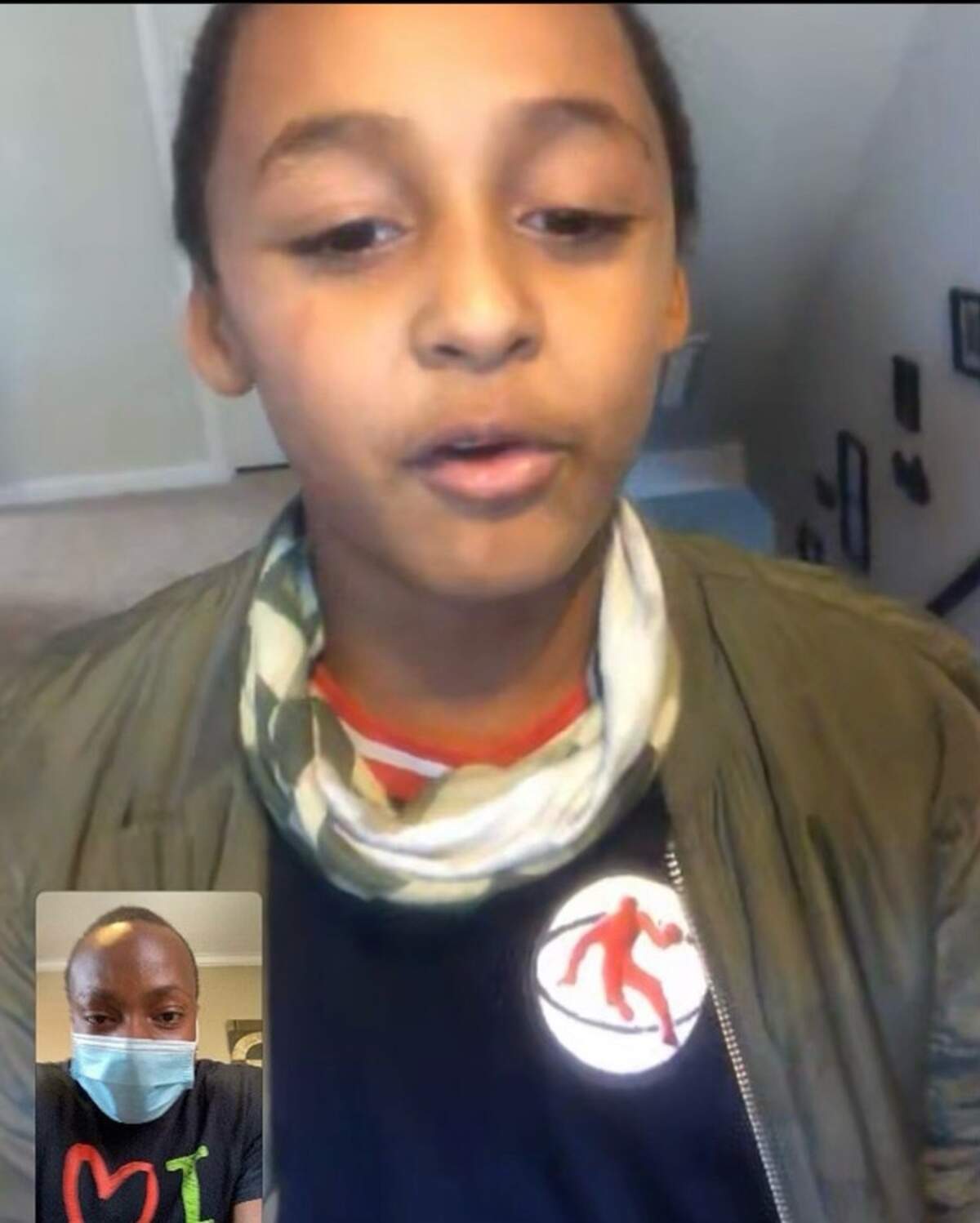 Jamal Stroud, the founder of Big Homie Lil Homie, facetimes one of his mentees Jabari Harris in order to keep in touch during the pandemic.