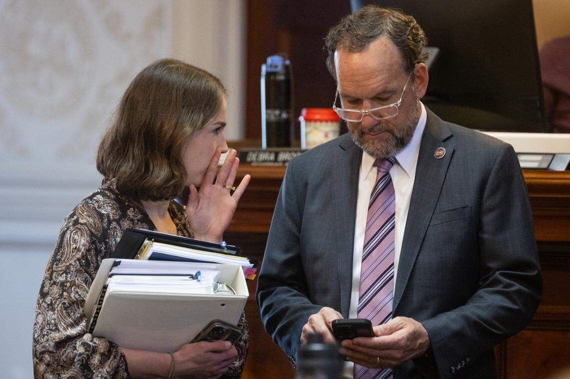 South Carolina Ways and Means research and budget analyst Abby Berquist Forster and South Carolina Ways and Means Chairman Bruce Bannister speak during the House debate on amendments to the state budget on Tuesday, March 11, 2025.