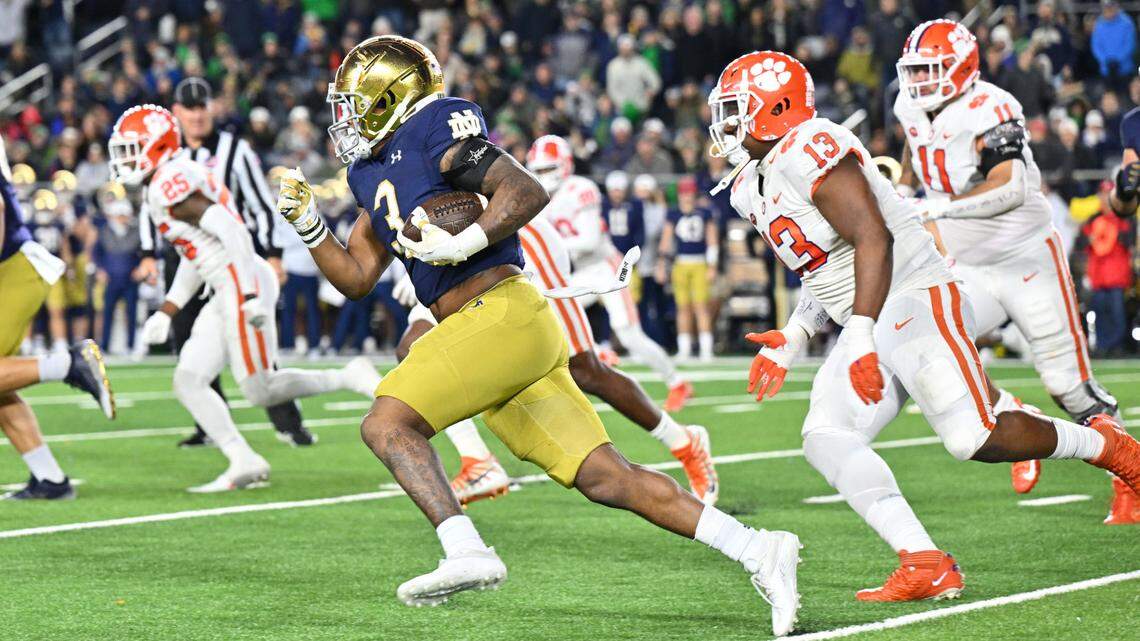 Nov 5, 2022; South Bend, Indiana, USA; Notre Dame Fighting Irish running back Logan Diggs (3) runs the ball against the Clemson Tigers in the third quarter at Notre Dame Stadium. Mandatory Credit: Matt Cashore-USA TODAY Sports