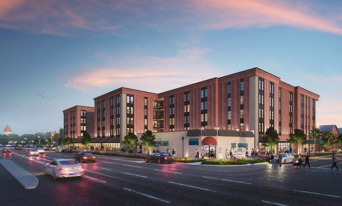 A rendering of the new apartments planned at the corner of Bull Street and Elmwood Avenue first shared in Feb. 2023 by Astral Development, showing the existing No Name Deli site incorporated into the complex.