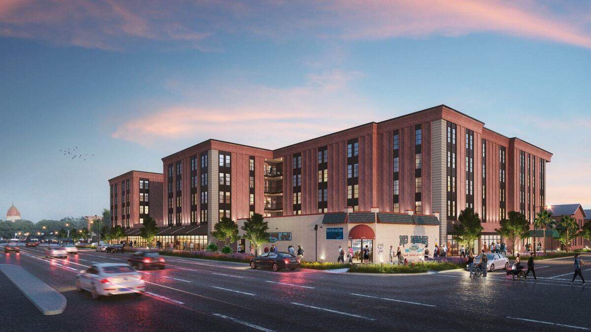 A rendering of a new mix-used housing and retail development set to come to the corner of Bull Street and Elmwood Avenue.