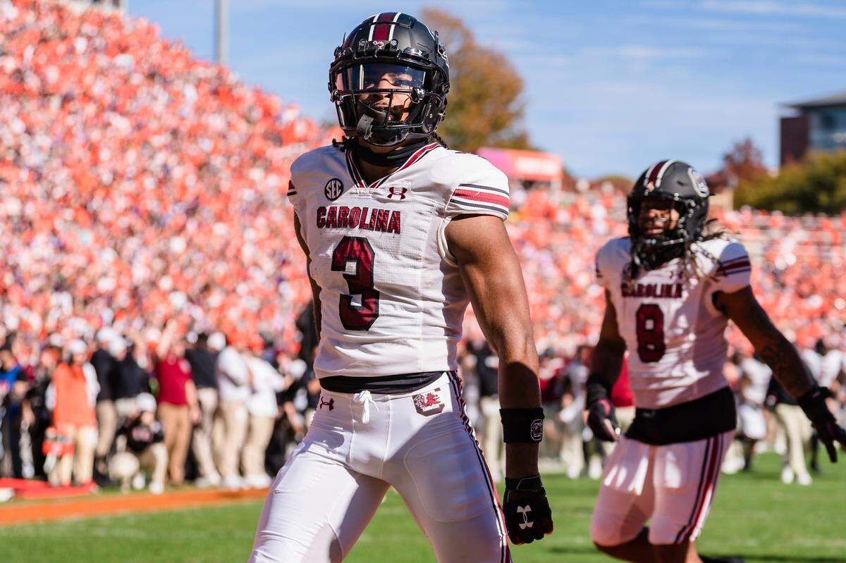 South Carolina wide receiver Antwane Wells Jr. (3) celebrates after scoring a touchdown in the first half of an NCAA college football game against Clemson on Saturday, Nov. 26, 2022, in Clemson, S.C.