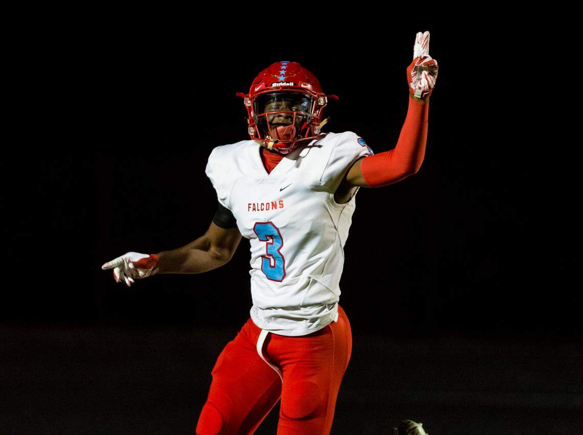 A.C. Flora Falcons Quincy Riley (3) celebrates returning the opening kickoff for a touchdown during the game between the AC Flora and Lower Richland at Lower Richland High School.