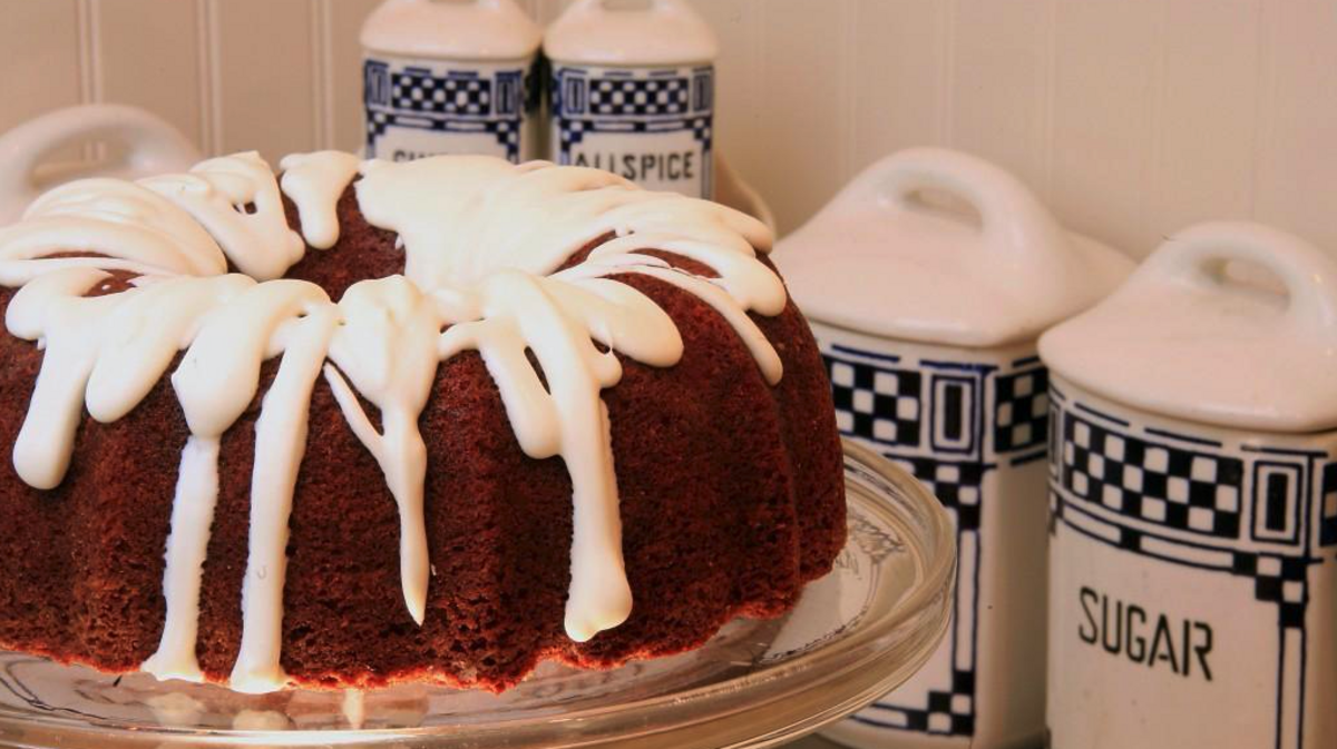 A file photo of a pear-spice Bundt cake with a white glaze.