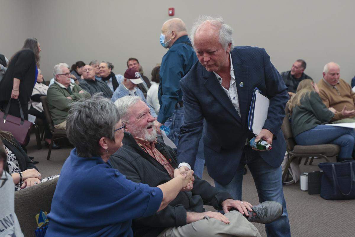 Chapin mayor Bill Mitchell greets people during a Town Council meeting on Tuesday, Jan. 20, 2026.