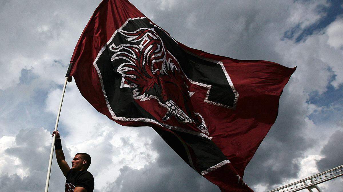 The University of South Carolina flag flies high after the Gamecocks scored against East Carolina in the third quarter at William-Brice Stadium.