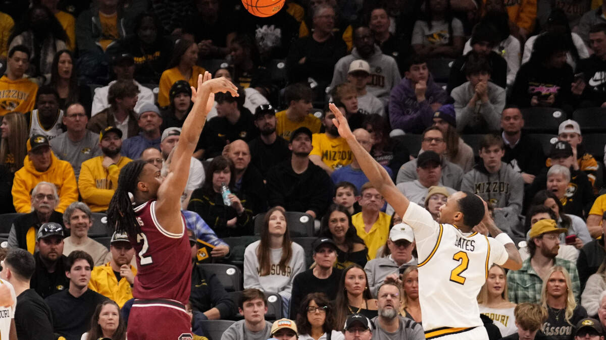 South Carolina Gamecocks guard Zachary Davis (2) shoots a three point attempt as Missouri Tigers guard Tamar Bates (2) defends during their game at Mizzou Arena.