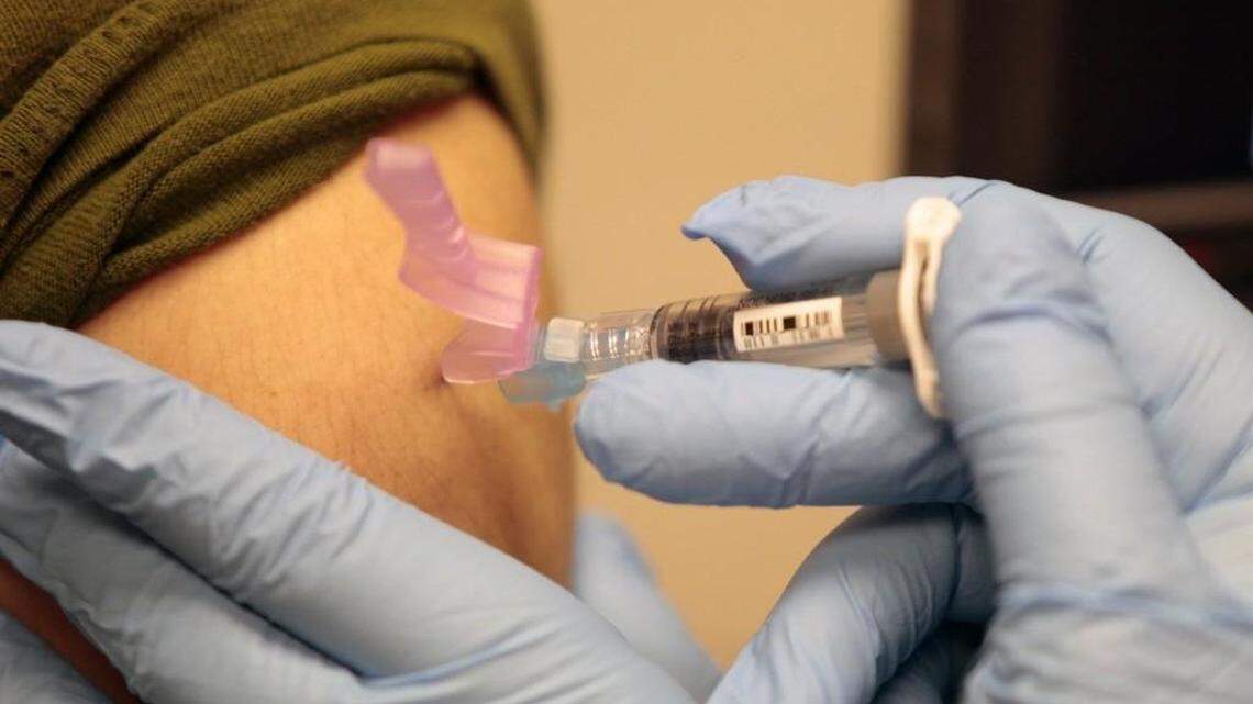 A patient getting an annual flu shot at the Duke Pulmonology clinic. Doctors say it’s not too late to get your flu shot as the flu season enters its most active period. this winter.
