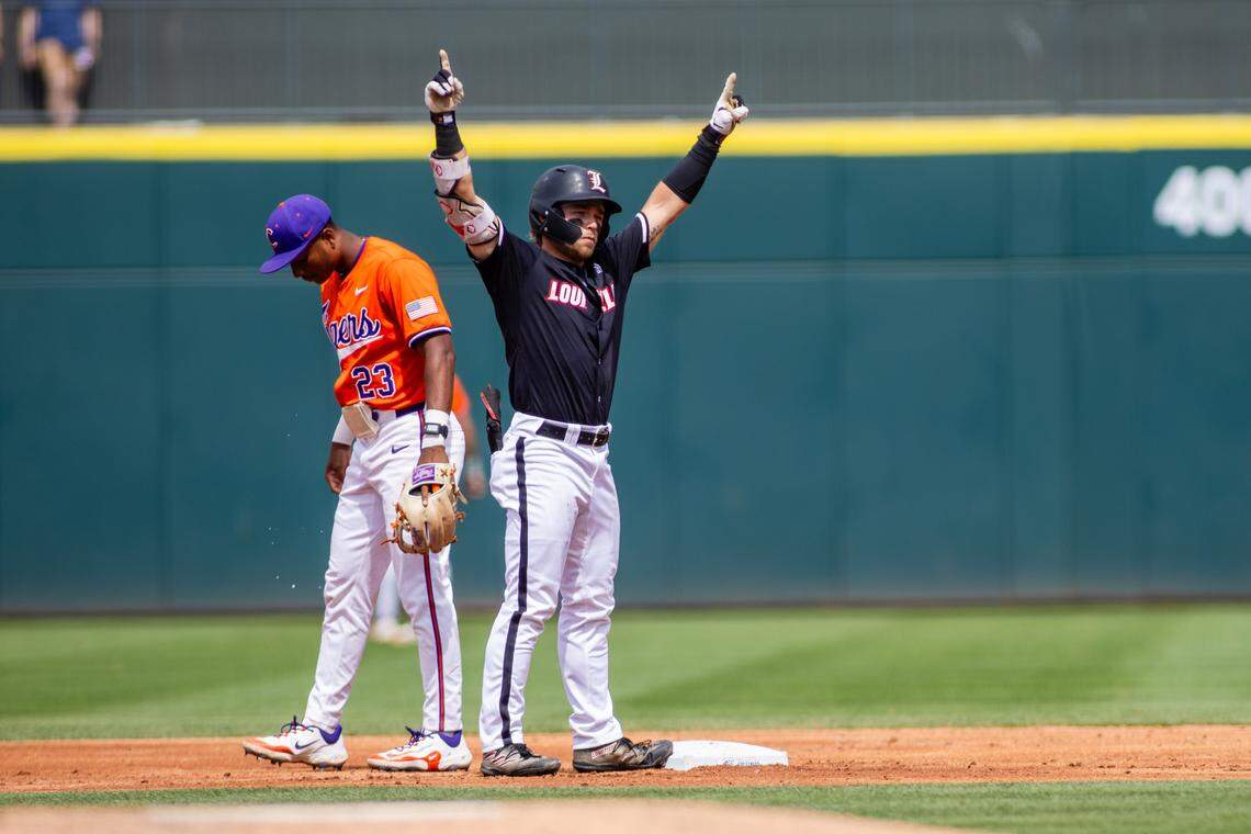 May 24, 2024; Charlotte, NC, USA; Louisville Cardinals infielder Dylan Hoy (9) celebrates a double in the second inning against the Clemson Tigers during the ACC Baseball Tournament at Truist Field.