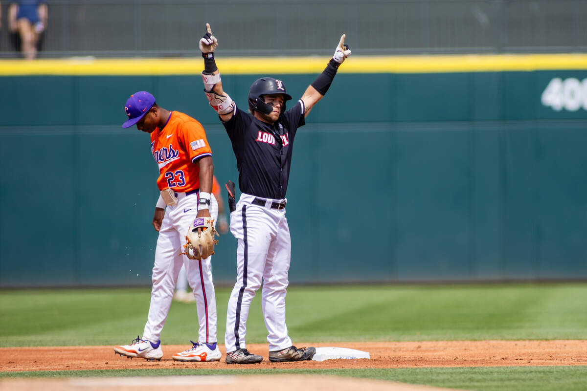May 24, 2024; Charlotte, NC, USA; Louisville Cardinals infielder Dylan Hoy (9) celebrates a double in the second inning against the Clemson Tigers during the ACC Baseball Tournament at Truist Field.