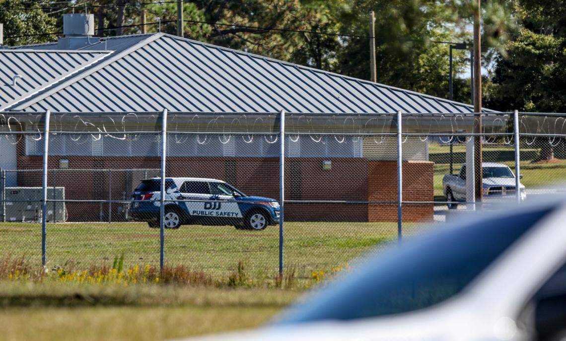 Emergency officials and law enforcement agencies stage outside the Department of Juvenile Justice in Columbia on Tuesday Oct. 18, 2022.