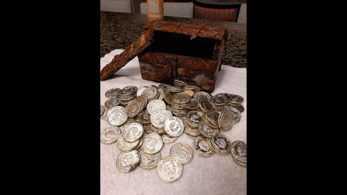 This old chest full of coins was found buried in a beach at Hilton Head, South Carolina. The coins proved to be toys.