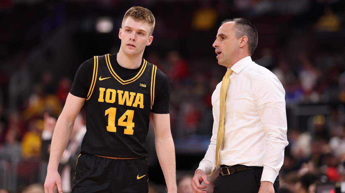 Iowa men’s basketball point guard Bennett Stirtz (left) and head coach Ben McCollum (right)