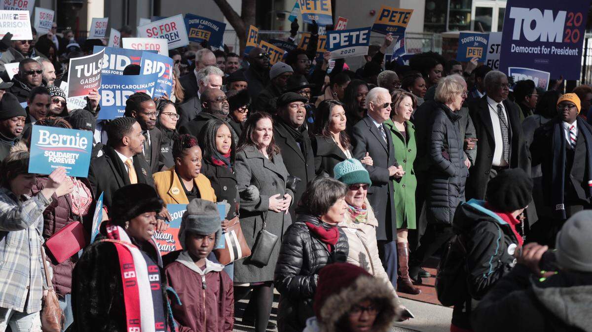 2020 Presidential hopefuls march in the front of the NAACP’s annual King Day at the Dome march in Columbia, South Carolina.