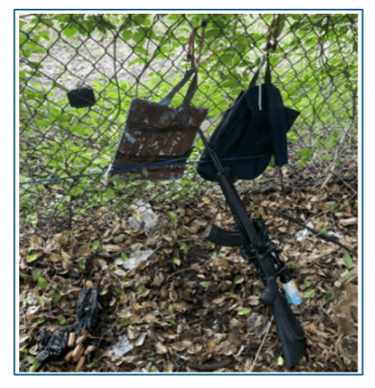 A gun, camera and bags containing “plates” capable of stopping small arms fire left behind by Ryan Routh at the fence of the golf course where authorities say he attempted to assassinate former-president Donald Trump.