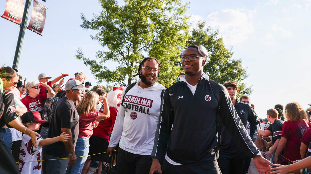 South Carolina quarterback LaNorris Sellers (16) is greeted by fans during the Gamecock Walk before South Carolina’s game against Akron in Columbia on Saturday, September 21, 2024.