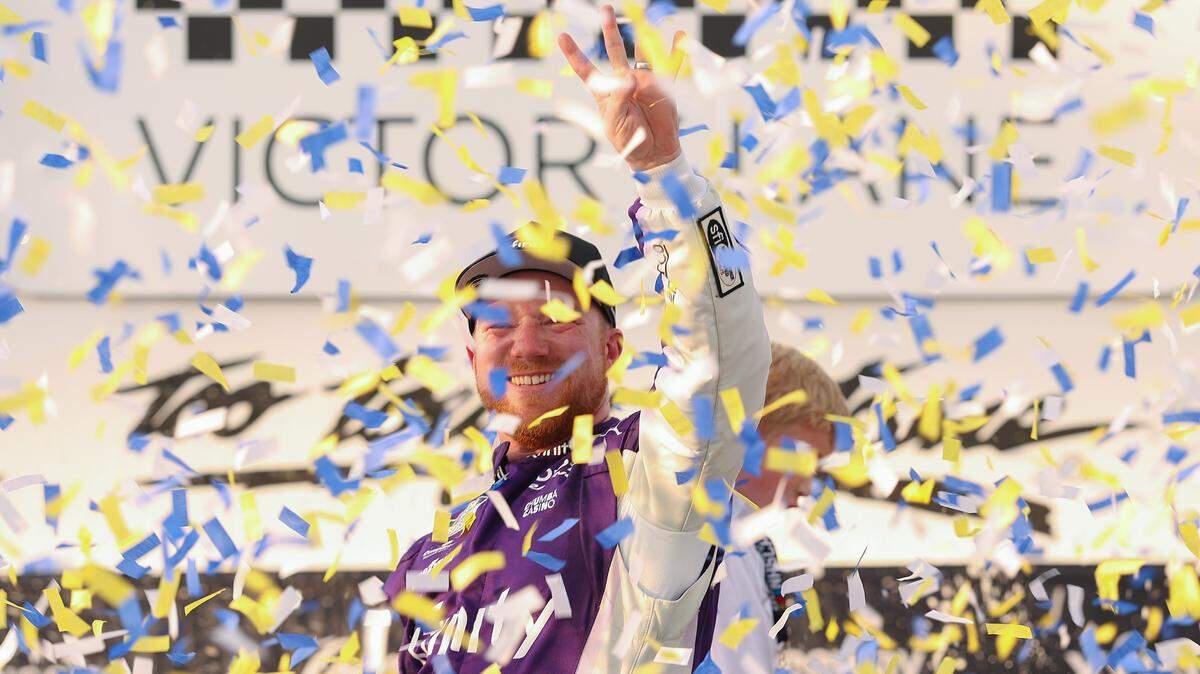 Tyler Reddick, driver of the No. 45 Xfinity Toyota, celebrates in victory lane after winning the NASCAR Cup Series Goodyear 400 at Darlington Raceway on March 22, 2026 in Darlington, South Carolina.