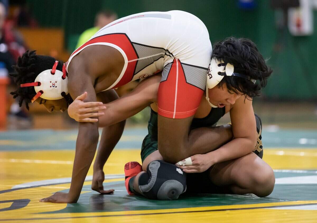 Tanner Carson of Ben Lippen wraps up Josh Prioleau of the Hammond School during the SCISA 2022 Duals State Wrestling Tournament at Ben Lippen on Saturday, February 5, 2022.