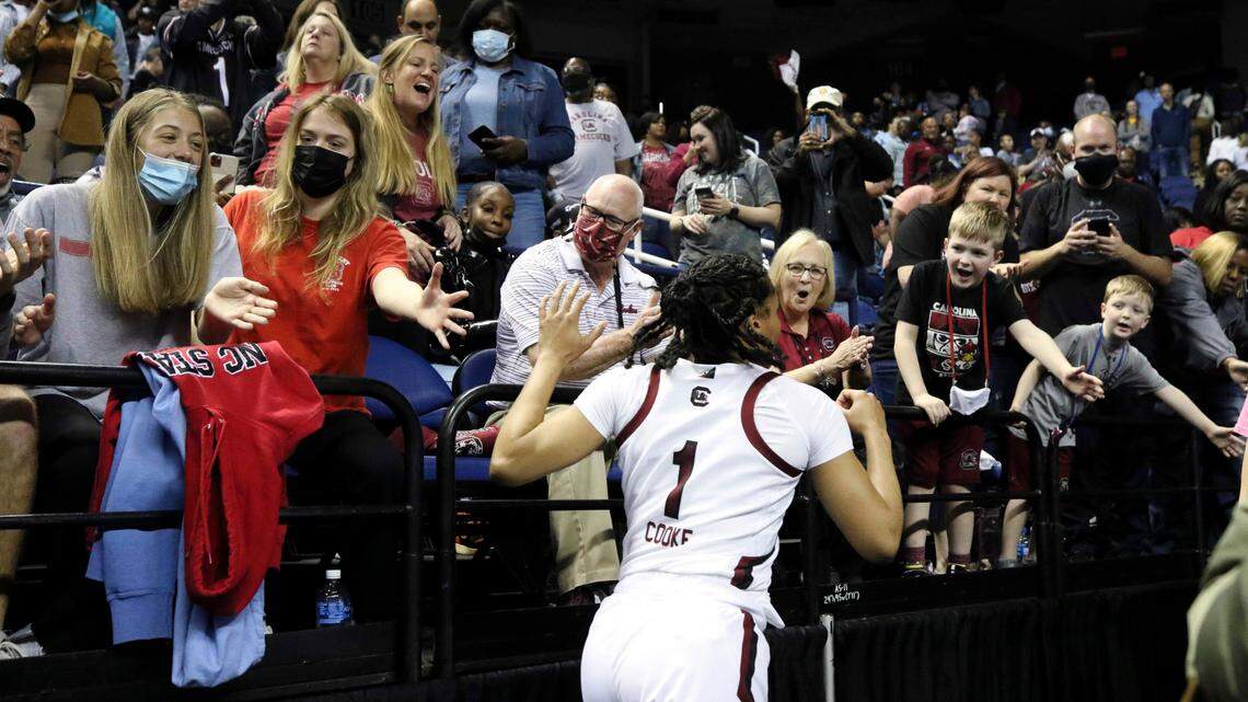 South Carolina’s Zia Cooke (1) greets fans after the Gamecocks won the Sweet 16 matchup against The University of North Carolina in the Greensboro Coliseum on Friday, March 25, 2022.