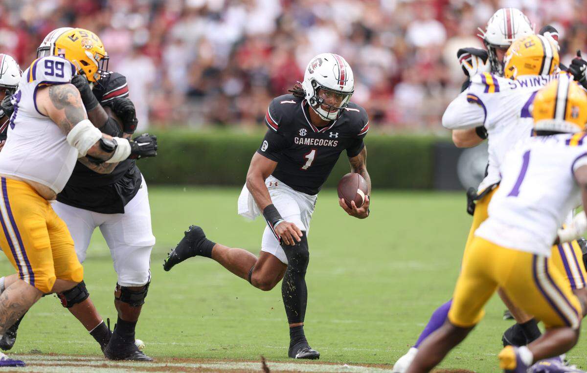 South Carolina quarterback Robby Ashford (1) runs the ball during the second half of South Carolina’s game against LSU in Columbia on Saturday, September 14, 2024.