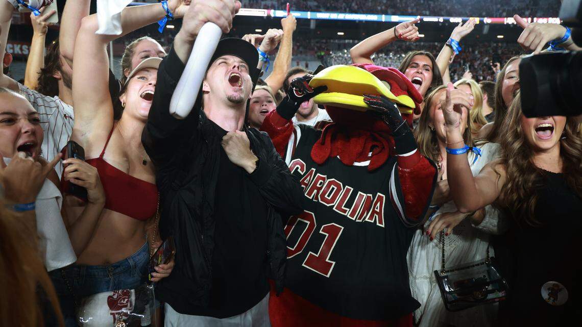 South Carolina fans rush the field after their team beat Texas A&M at Williams-Brice Stadium on Saturday, November 2, 2024.