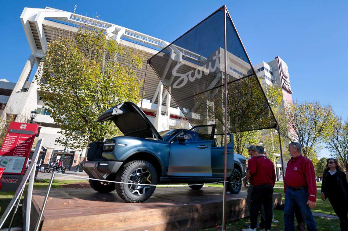 People look at the new Terra truck by Scout Motors. The concept cars were on display at Williams-Brice Stadium before USC’s game against Missouri on Saturday, Nov. 16, 2024. Scout is opening an electric vehicle plant in Columbia that will employ thousands of people.