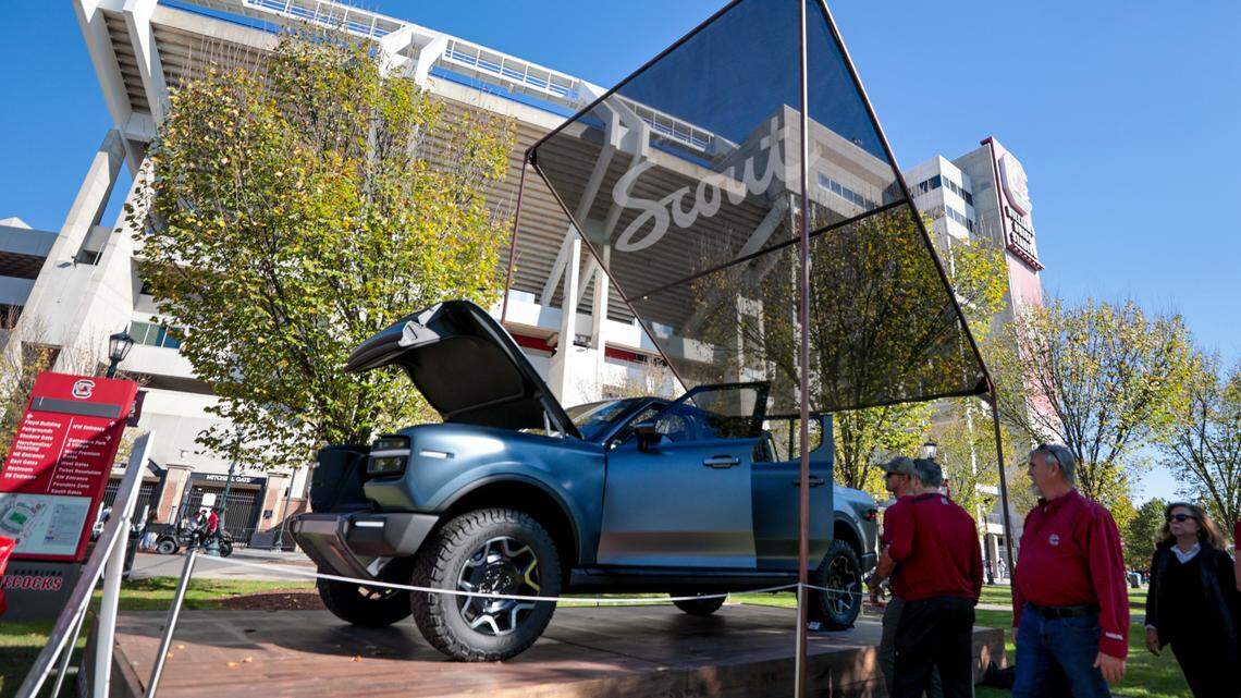 People look at the new Terra truck by Scout Motors. The concept cars were on display at Williams-Brice Stadium before USC’s game against Missouri on Saturday, Nov. 16, 2024. Scout is opening an electric vehicle plant in Columbia that will employ thousands of people.