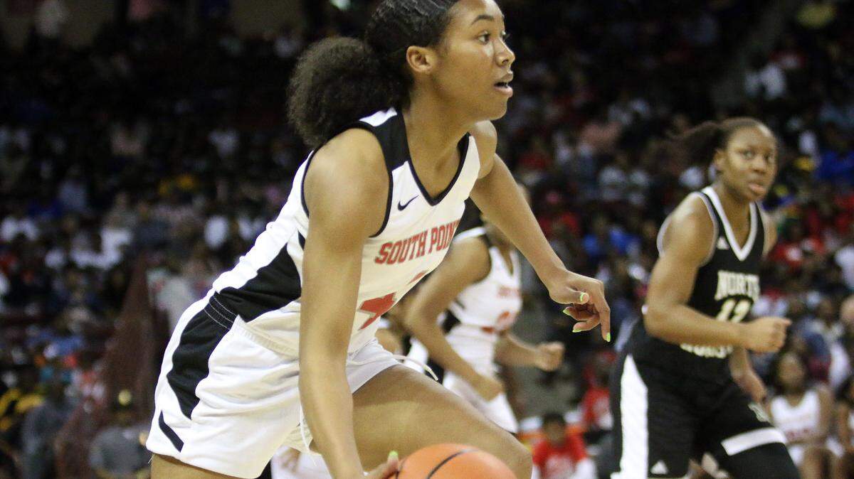 South Pointe’s Scarlett Gilmore dribbles Saturday against North Augusta in the state championship game at Colonial Life Arena in Columbia.