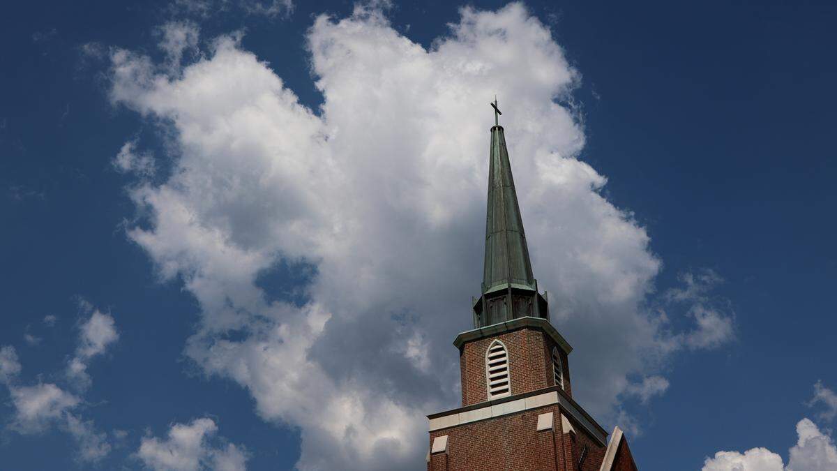 The former site of Rosewood Church is being transformed into three apartment buildings. The sanctuary of the church will include eight apartment units, one of which is built around the 30-foot-tall stained glass window from the church. The steeple will also remain in place.
