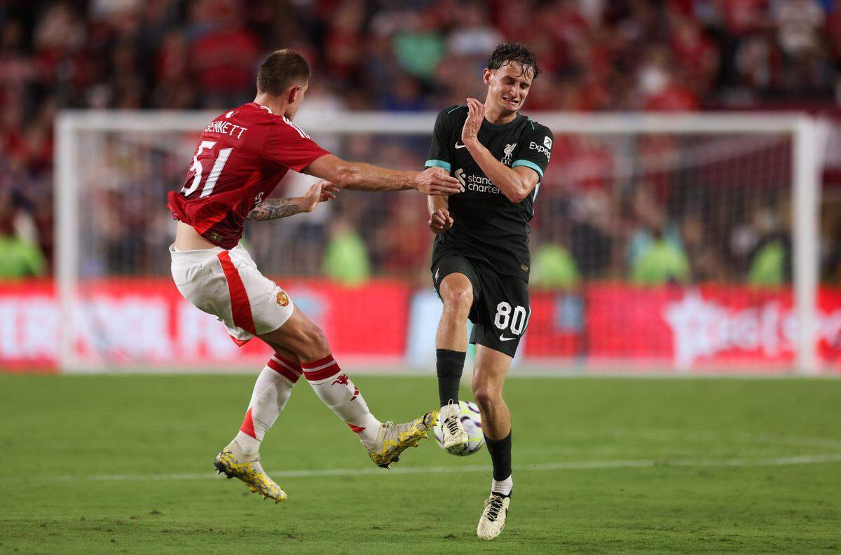 Manchester midfielder Rhys Bennett (51) and Liverpool midfielder Tyler Morton go for the ball during the Rivals in Red International Friendly soccer match between Manchester United and Liverpool in Columbia on Saturday, August 3, 2024.