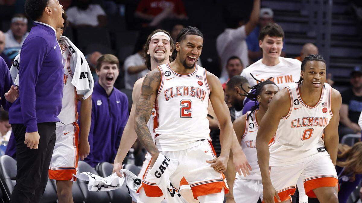 The Clemson bench celebrates in the first half of Wake Forest’s game against Clemson in the second round of the 2026 ACC Men’s Basketball Tournament at the Spectrum Center in Charlotte, N.C., Wednesday, March 11, 2026.